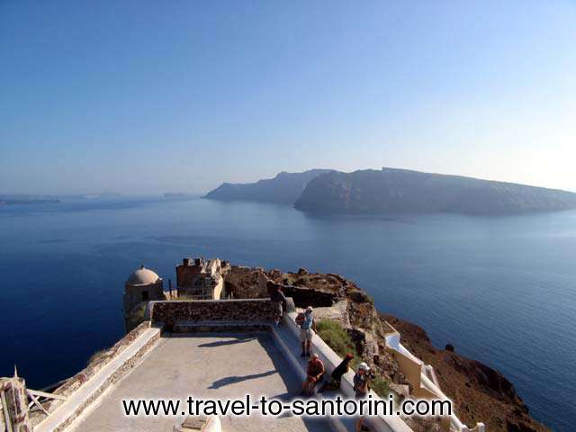 View of Thirassia from within the castle of Oia, one of the must places in Santorini. Also visible Aspronissi and a small part of Palaia Kammeni.  